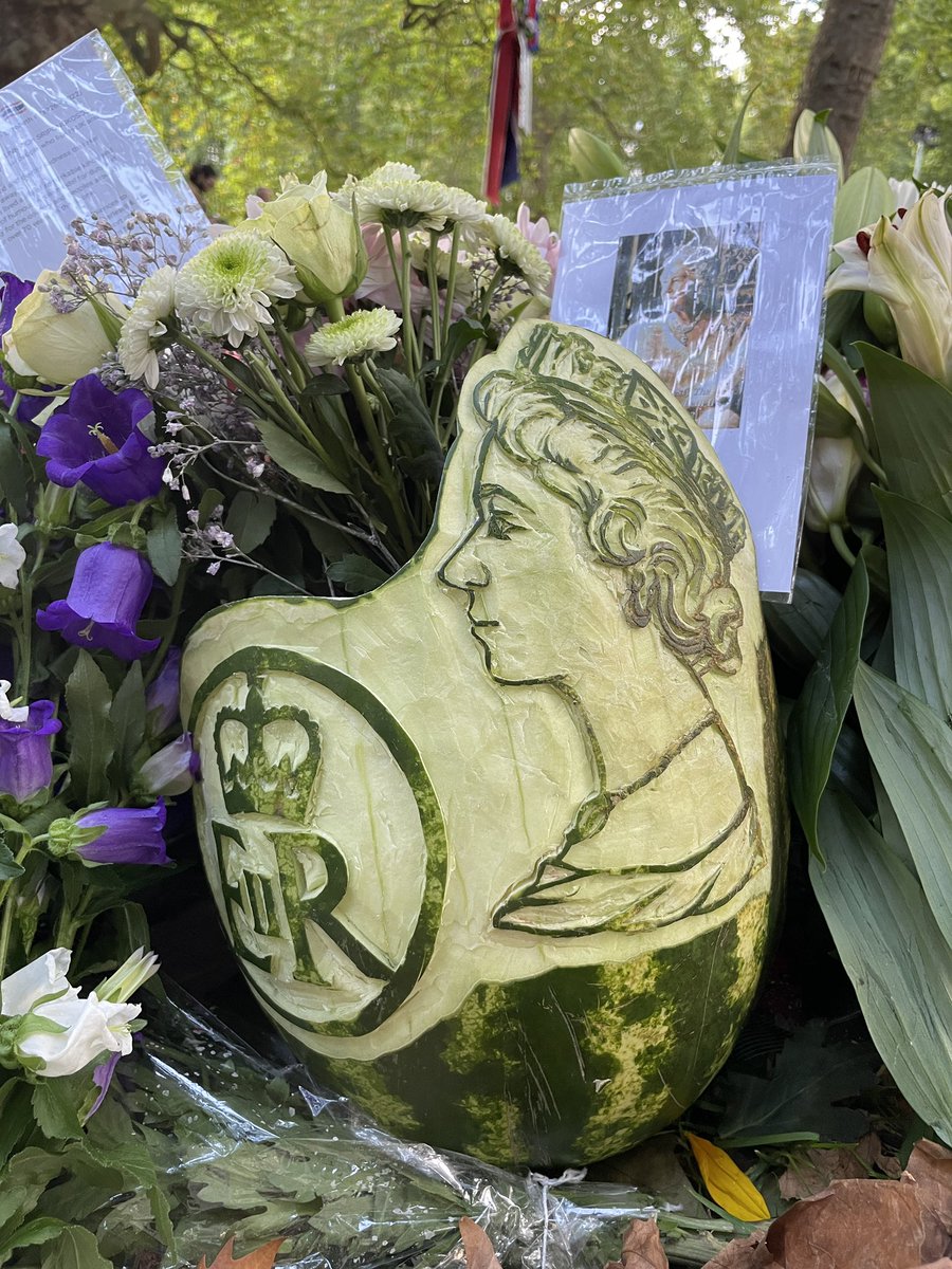 Amongst all the beautiful tributes for the #QueenElizabeth in St Jamie’s park, a watermelon carving was rather unexpected.