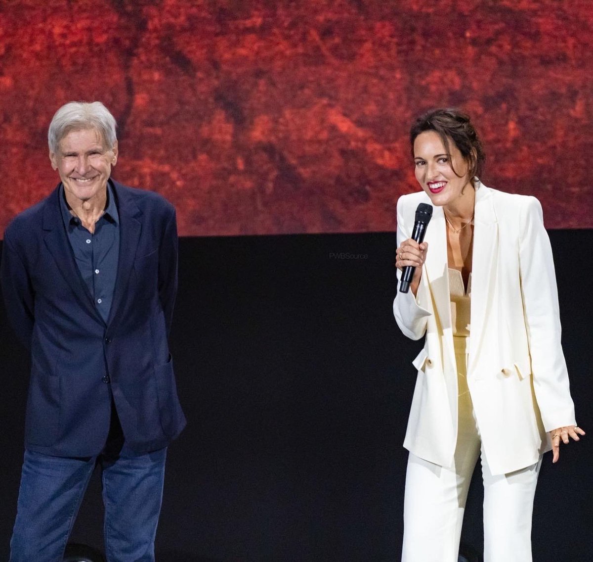 phoebewallerbr1's tweet photo. Phoebe Waller-Bridge &amp; Harrison Ford on stage for Indiana Jones 5 at #D23Expo2022 ✨ https://t.co/U2gOa2Xaj4