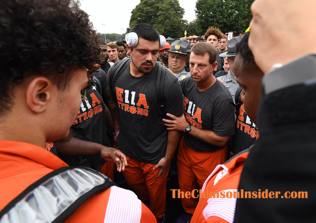 Great move by Dabo and the team to wear the Ella shirts for Bryan Bresee's sister and to let him lead Tiger Walk.  #Clemson family