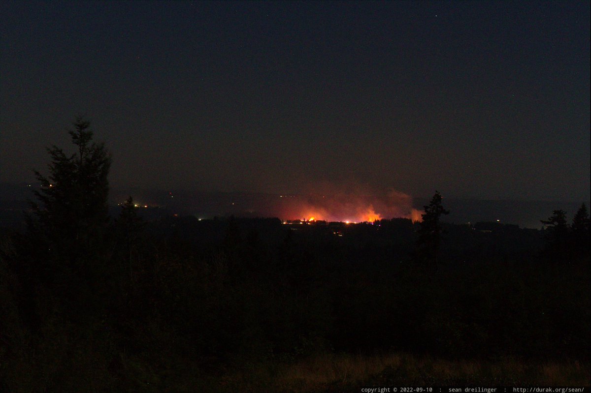 RadRachelLove's tweet photo. My husband Sean Dreilinger @sed was able to take some much better photos using a real camera last night. Here are some shots of the #McIver fire in Estacada from our back deck in Beavercreek, OR about 3 miles away. Thank you SO MUCH to @clackamasfire for containing this!!! 🔥🔥🔥 https://t.co/fFePlJ4E29
