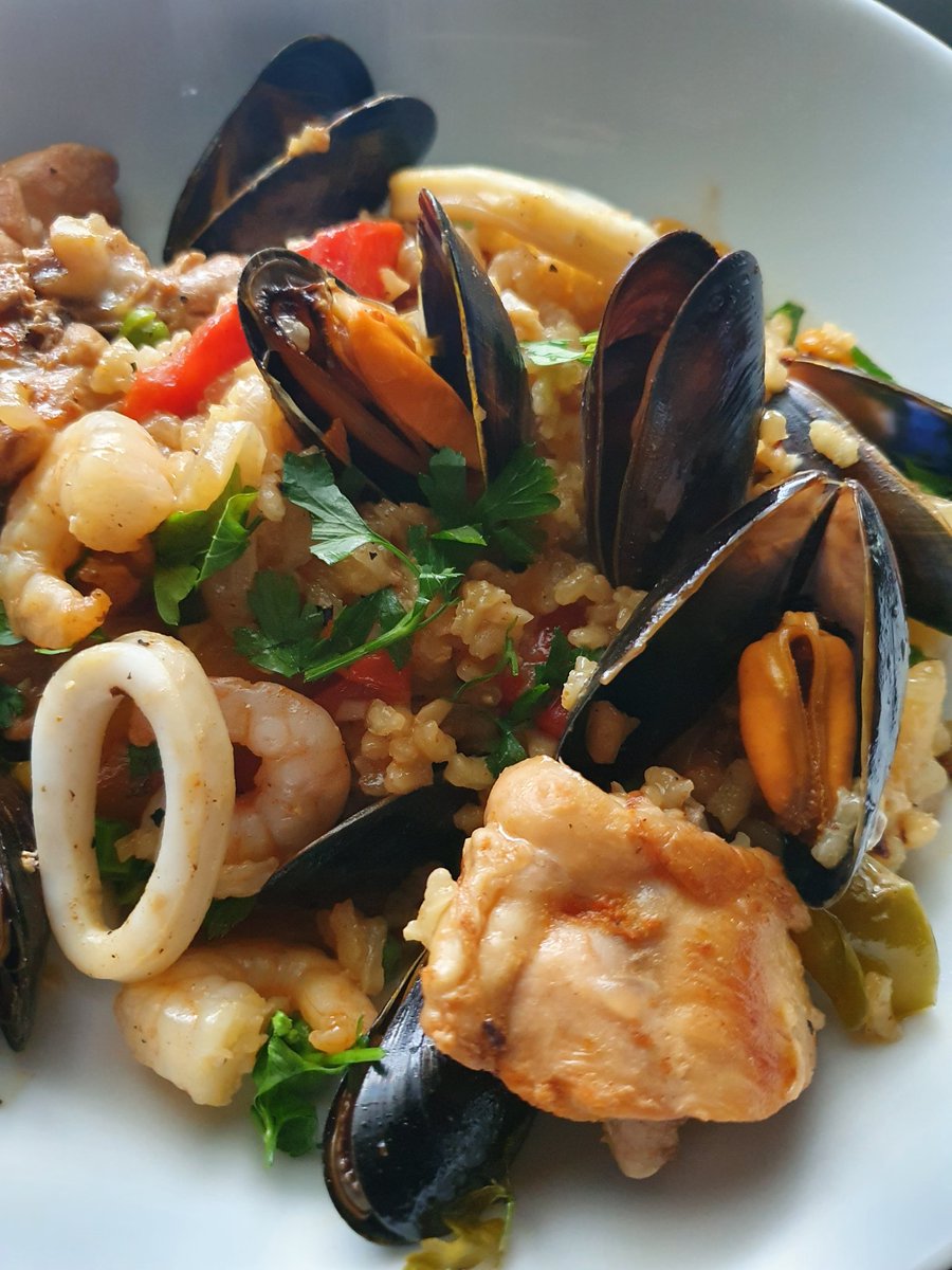 FoodIFancy's tweet image. Dinner: Paella with overcooked rice. Still right tasty