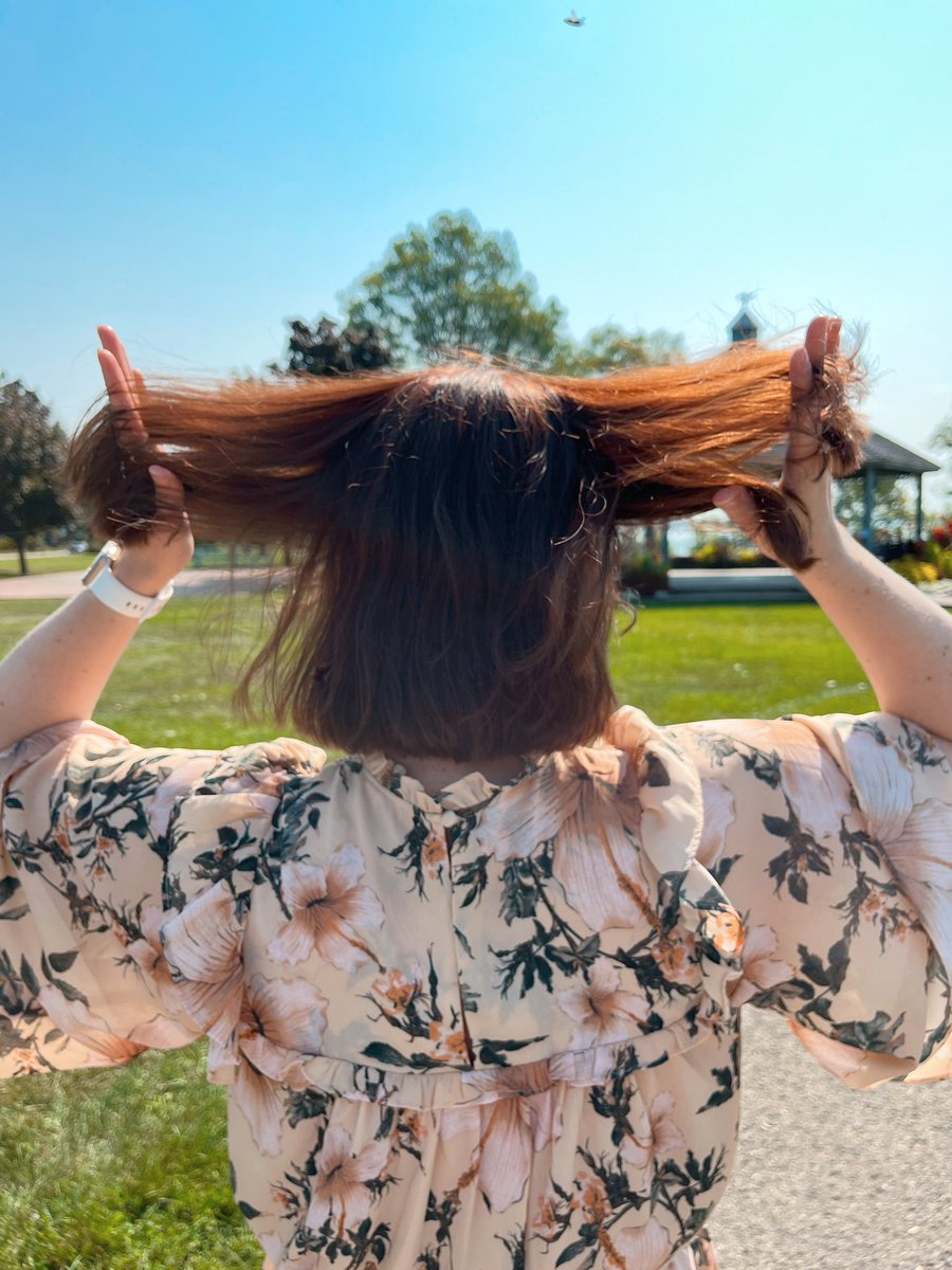 My husband has perfect timing when taking photos: me combing my hair, and a bee flying by. (I didn't know about the bee, or this photo would have been very different. 🐝