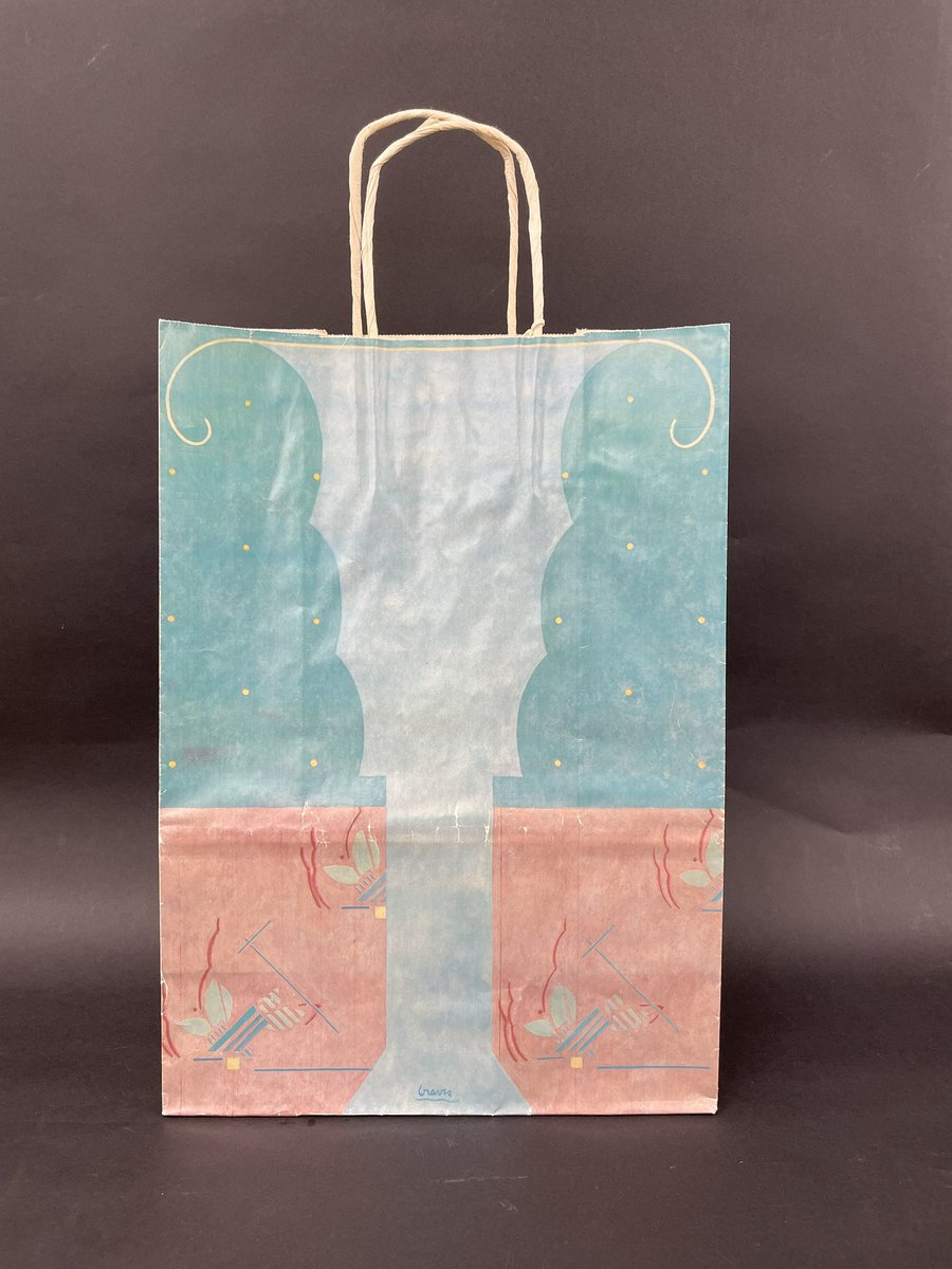 252/365: This beautiful, mirrored illustration on a Bloomingdale's bag was designed by Michael Graves in 1984.