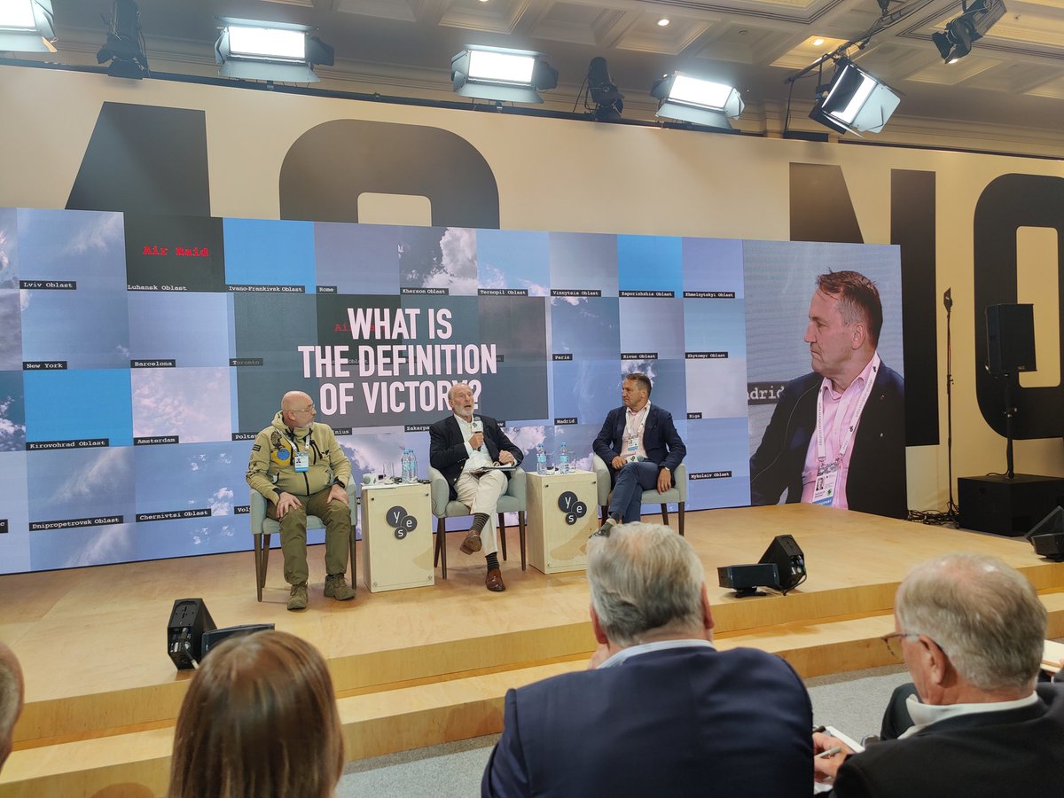 anneapplebaum's tweet photo. The Ukrainian defense minister, Reznikov, on a panel with @radeksikorski, today. Agreed on definition of victory: Russia leaves all of  Ukraine, pays reparations. World holds war crimes trials. https://t.co/FLapn92lVE