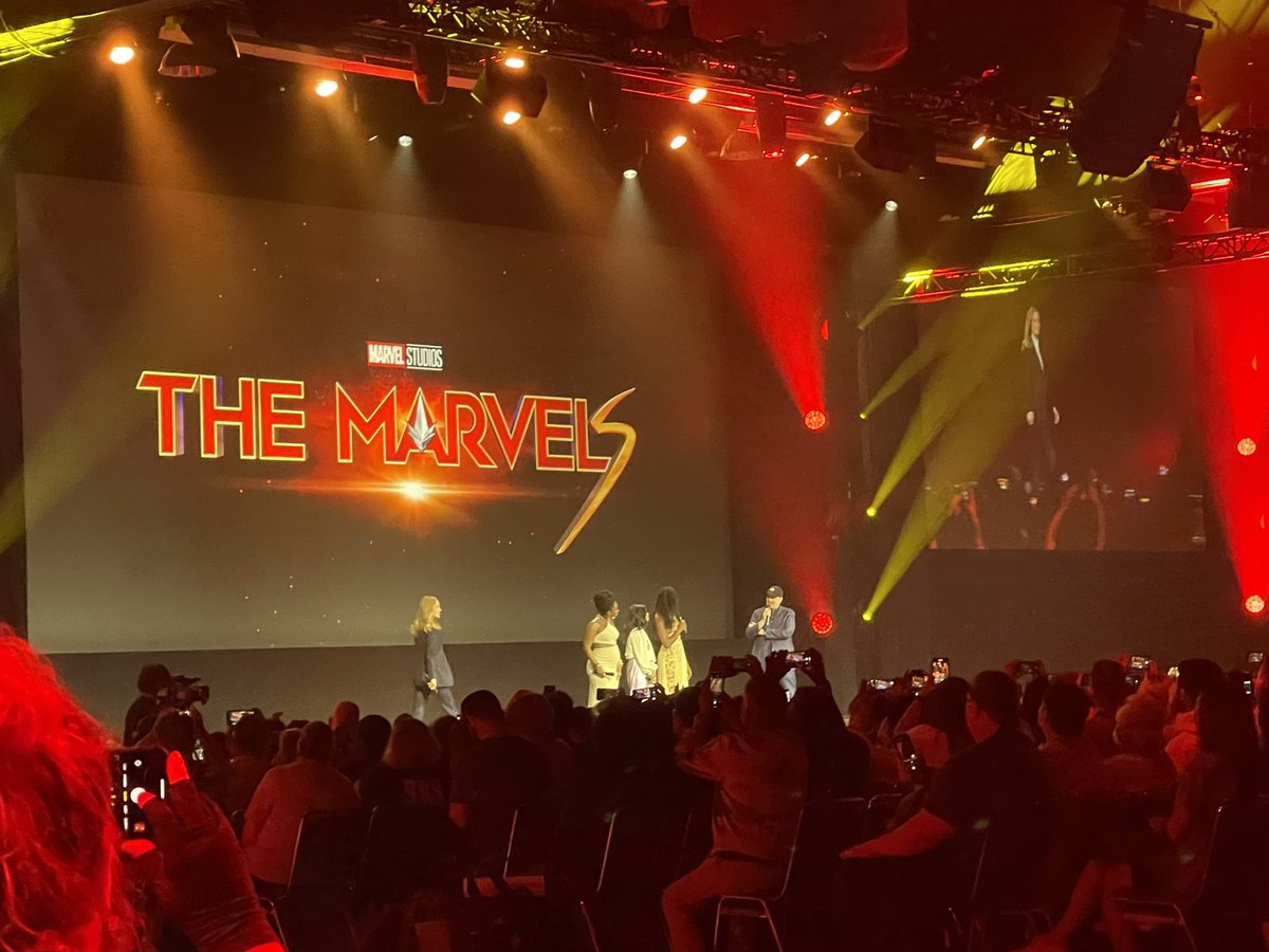 empiremagazine's tweet photo. Last thing from Marvel, and it’s The Marvels! Director Nia DaCosta and stars Brie Larson, Iman Vellani and Teyonnah Parris take to the stage. #D23Expo https://t.co/q2VDl5Yhp6