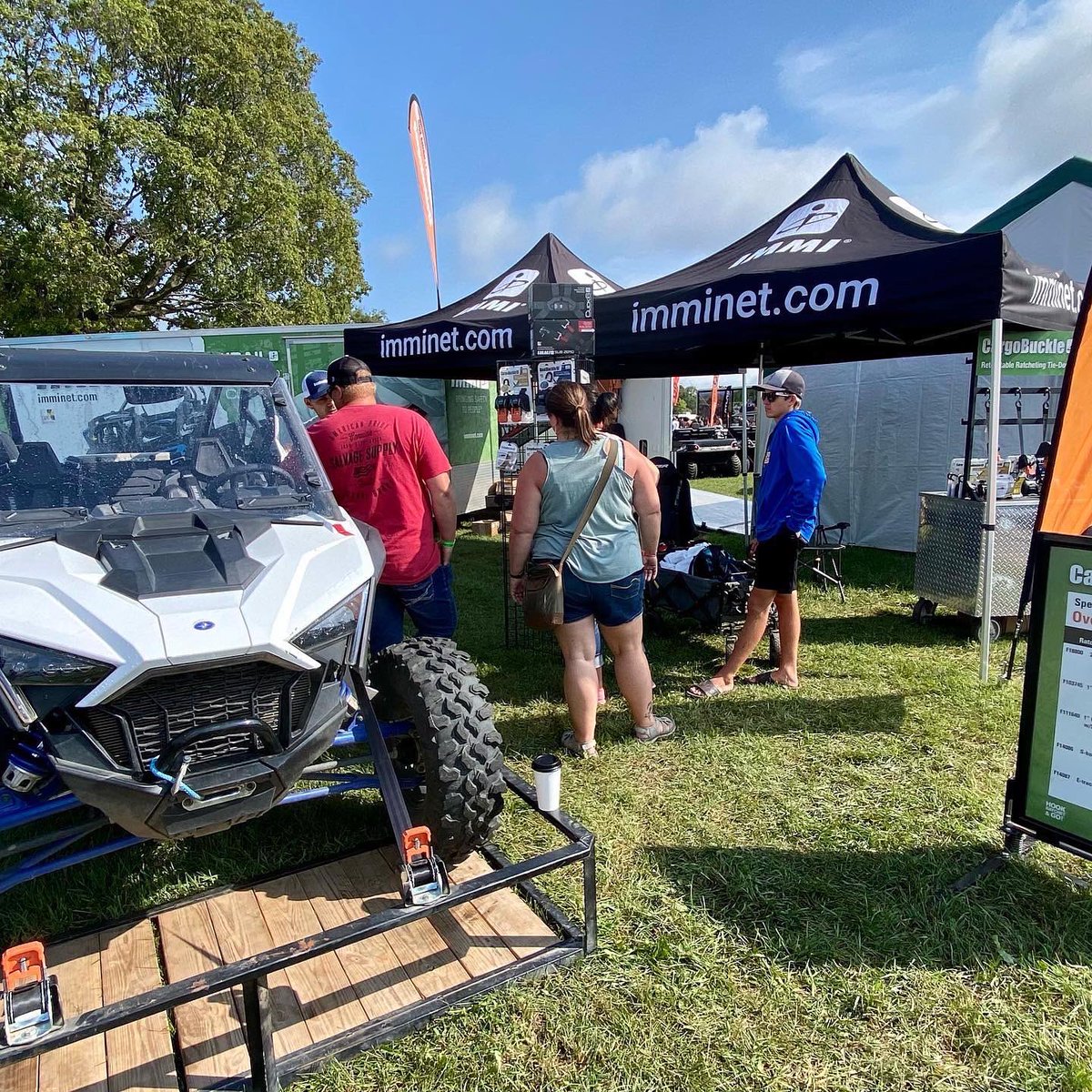 BuyIMMI's tweet photo. Stop by the IMMI booth at Hay Days.  See how CargoBuckle can save you time when you tie-down.  Just Hook, Ratchet, &amp; Go. We got great Hay Days specials at the show and online. #haydays #haydays2022 #cargobuckle #tiedown #utvlife #sxs https://t.co/BV3JM96zIz