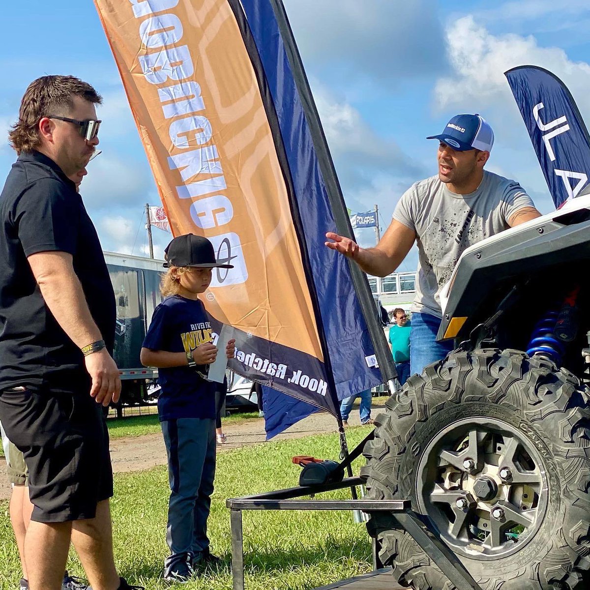 BuyIMMI's tweet photo. Stop by the IMMI booth at Hay Days.  See how CargoBuckle can save you time when you tie-down.  Just Hook, Ratchet, &amp; Go. We got great Hay Days specials at the show and online. #haydays #haydays2022 #cargobuckle #tiedown #utvlife #sxs https://t.co/BV3JM96zIz