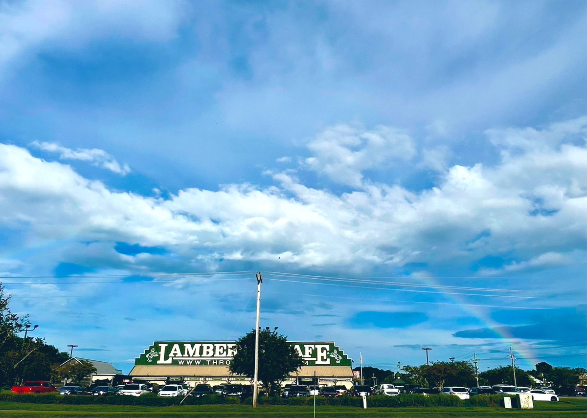 CatherineCaudle's tweet photo. Rainbow over Lambert’s, Foley, AL. #throwedrolls @VisitALBeaches @spann @NWSMobile 🌈🍞 https://t.co/X0yZKN6MYs