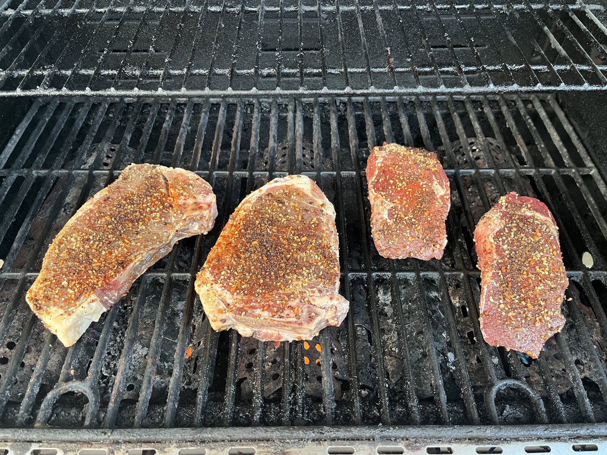 DadMaguire's tweet photo. On the grill. 
Two Bone in NY Strips and
Two Rib-eyes. 
#letsgrill #bbq https://t.co/xJIXe5Z67J