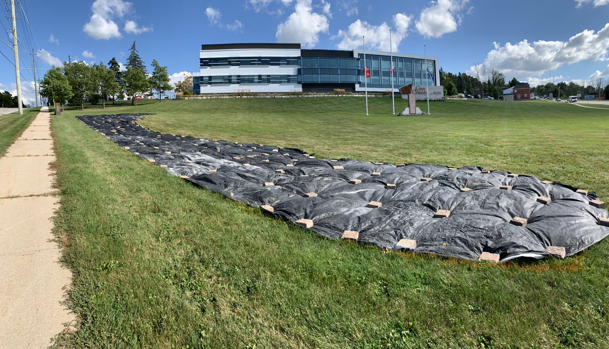The County of Grey is naturalizing some of the lawn around the administration building. The area under the landscape fabric will become a tree-lined walking trail. It’s going to be beautiful! Stay tuned! <a href="/GreyCounty/">Grey County</a> #climateaction