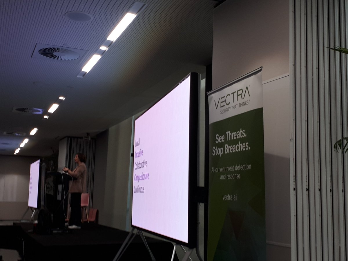 GyledC's tweet photo. The amazing @lady_nerd talking about how we can protect each other in the Day 2 keynote @BSidesMelbourne. "When one of us is breached, it hurts all of us." #BSidesMelb2022 #womenintech #womeninsec https://t.co/DZA71pYC5f