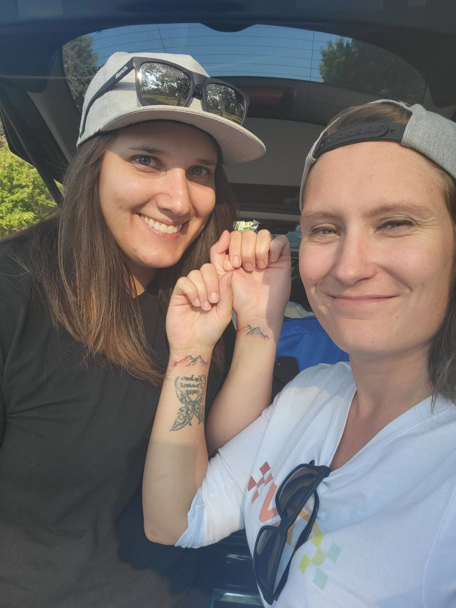 EarperKiersten's tweet photo. Got my first tattoo! Rainbow mountains! We even got a little piece of the mountain where we first said I love you! Didn't plan it. Completely spontaneous and walked in! I love it so much and this woman!! https://t.co/xn3Cnx7fEW