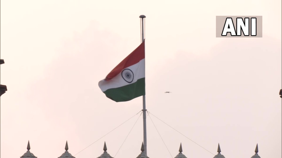 ANI's tweet image. Delhi | National flags at Red Fort and Rashtrapati Bhavan fly at half-mast as one-day state mourning is being observed in the country following the demise of Queen Elizabeth II.