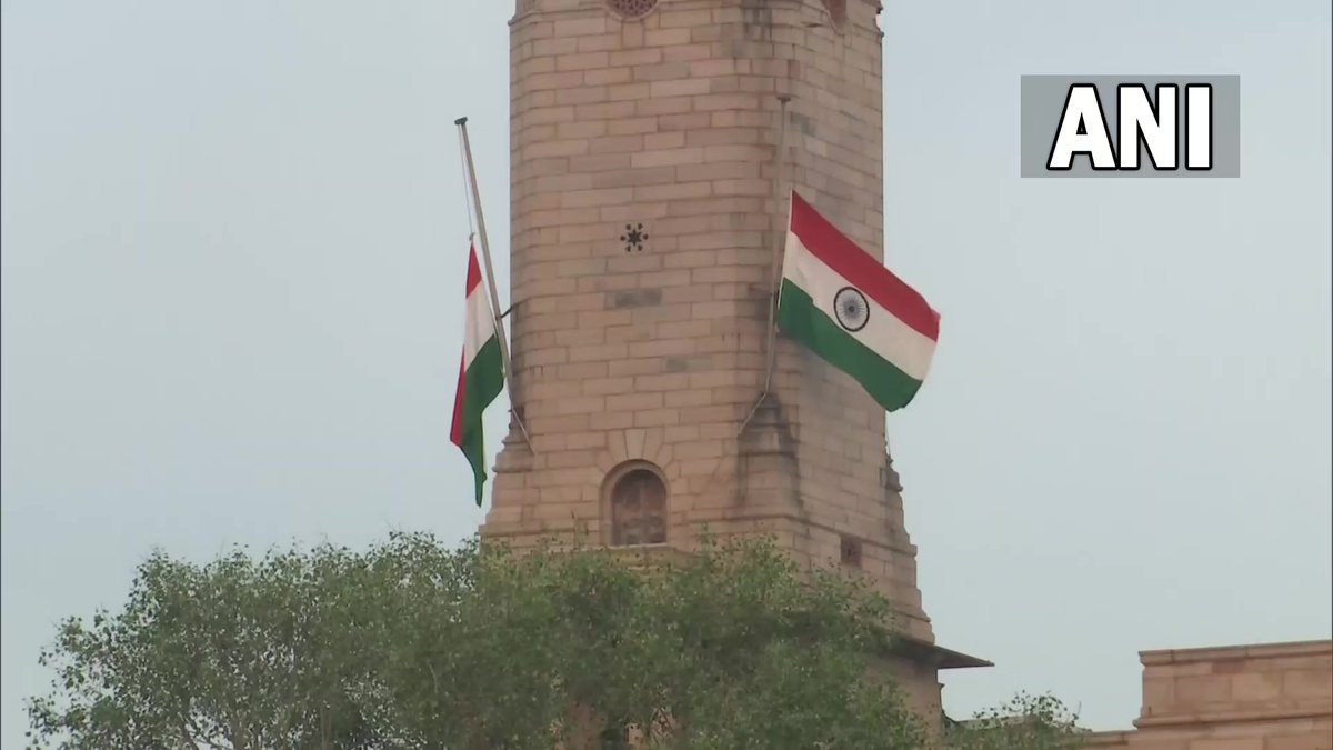 ANI's tweet image. Delhi | National flags at Red Fort and Rashtrapati Bhavan fly at half-mast as one-day state mourning is being observed in the country following the demise of Queen Elizabeth II.