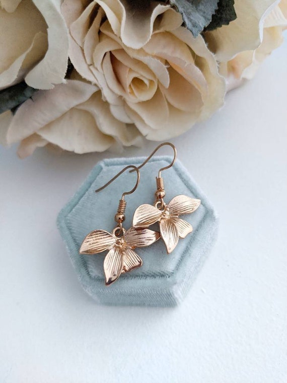 Gold orchid earrings, flower dangles, rustic etsy.me/3i3yroG #giftforwomen #birthdaygift #uniquegiftforher #goldflowerearrings @etsymktgtool