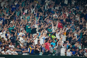 Fans cheering at T-Mobile Park.