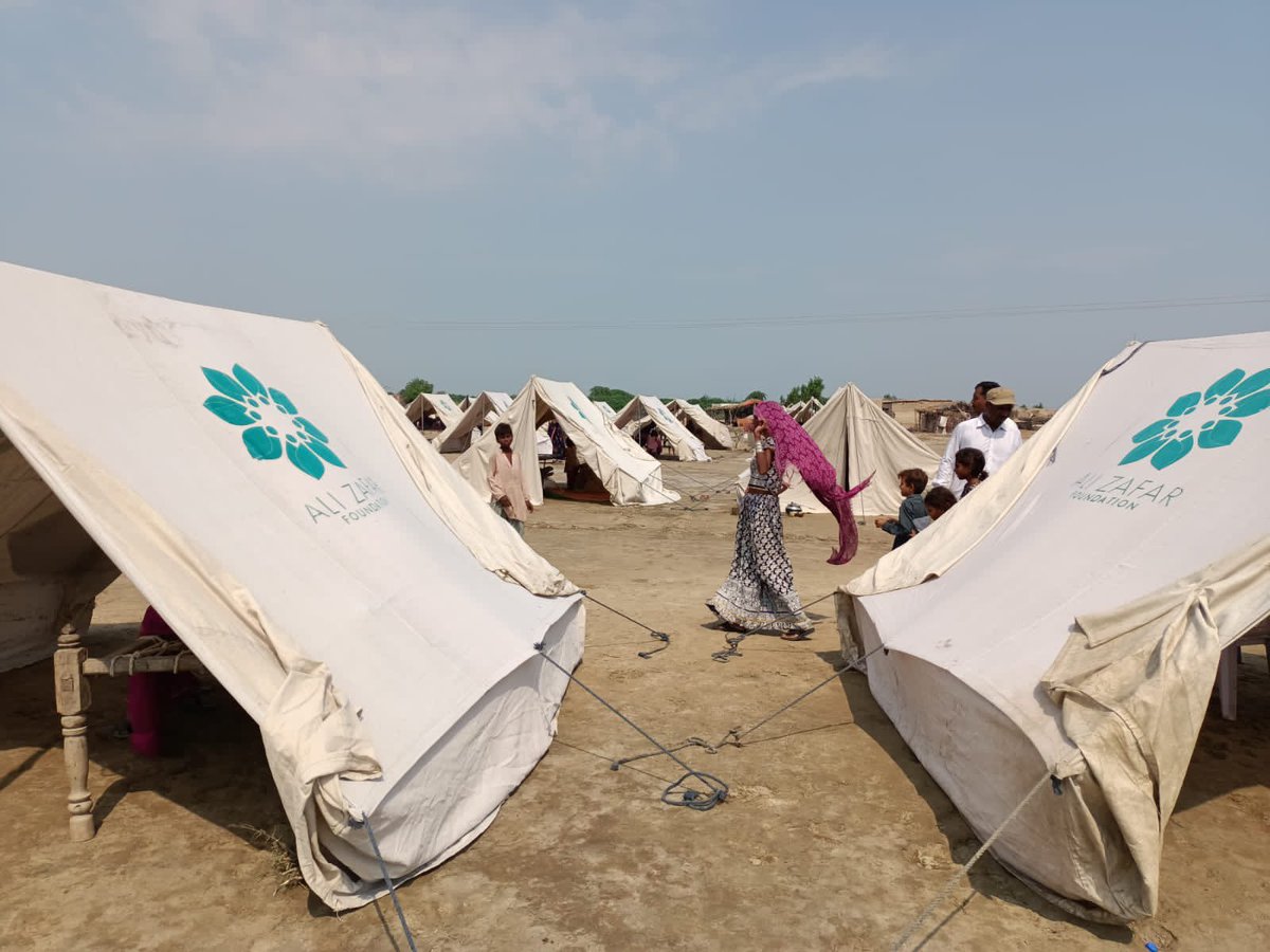 AliZafarsays's tweet photo. Our team has reached one of the most affected areas in interior Sindh. What they tell me is heart-wrenching. Scorching heat with no roof or clean water besides countless other issues. We’ve started setting up the tents but so much more needs to be done. #PakistanFloods2022 https://t.co/y0rQjhL008