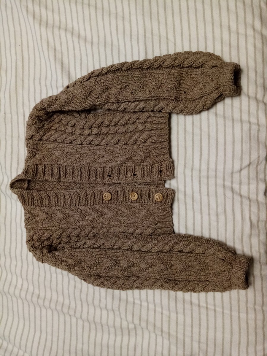 KnittedPanda's tweet photo. Had this oatmeal aran yarn for a while and as it was the right colour I decided to make a cardigan inspired by Dr Watsons in BBC sherlock! I used the chevron pattern by Amy Walker but used my own cardigan design:) #MadewithMarriners #knitting #MarrinerCosy https://t.co/kXyJozHUtC