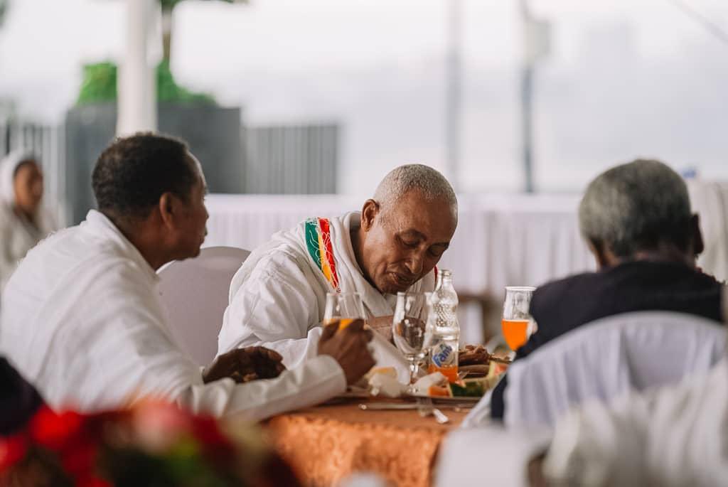 PMEthiopia's tweet photo. In celebration of the Ethiopian New Year, Prime Minister Abiy Ahmed and First Lady Zinash Tayachew hosted pensioners and the elderly for a holiday luncheon.              #PMOEthiopia https://t.co/9kMidUh7Tm