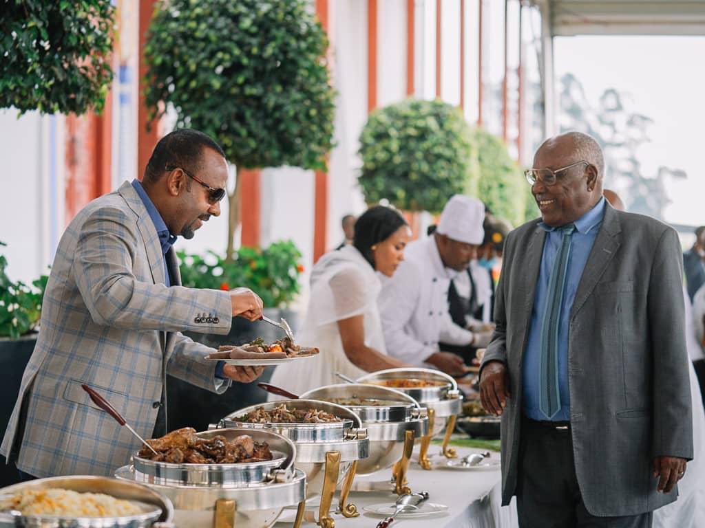 PMEthiopia's tweet photo. In celebration of the Ethiopian New Year, Prime Minister Abiy Ahmed and First Lady Zinash Tayachew hosted pensioners and the elderly for a holiday luncheon.              #PMOEthiopia https://t.co/9kMidUh7Tm