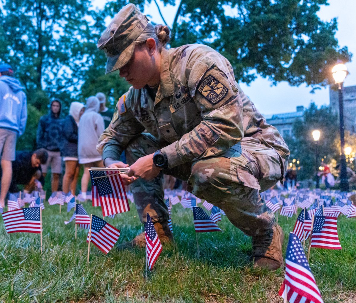 LehighU's tweet photo. 🇺🇸 This morning the Lehigh Armed Forces Support Club and Steel Battalion ROTC held a flag-raising ceremony and placed 2,977 flags on the CUC lawn to remember and honor the lives lost September 11, 2001. We will #NeverForget. https://t.co/DAx3CnSd35