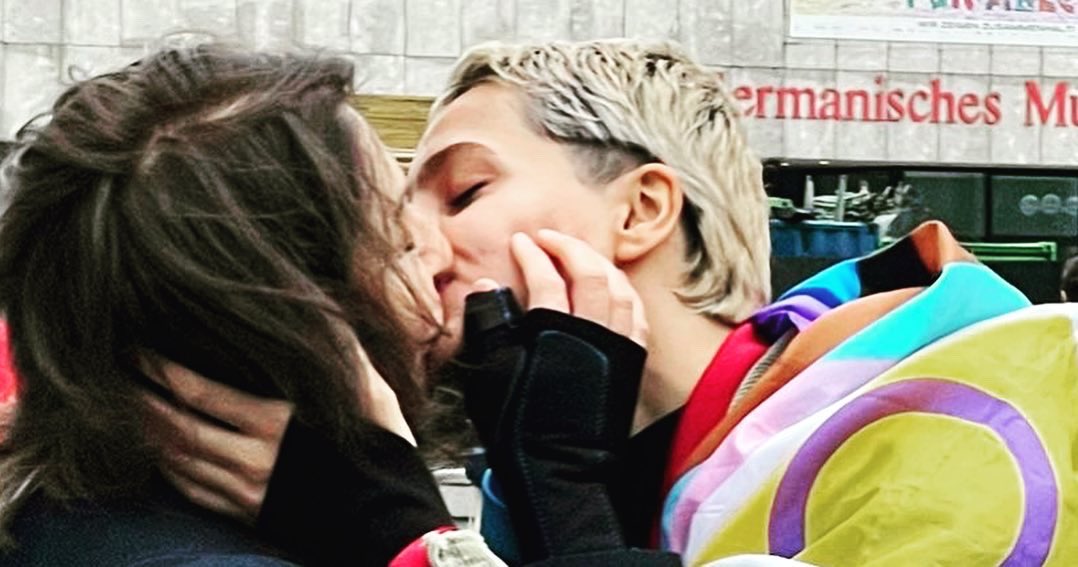 MaryamNamazie's tweet photo. A kiss with @Me1ikaAhmadi in defence of #lesbians in #Iran facing execution

#savezahrasedighihamedani #saveelham #loveisnotacrime https://t.co/ItrjM6YiAy