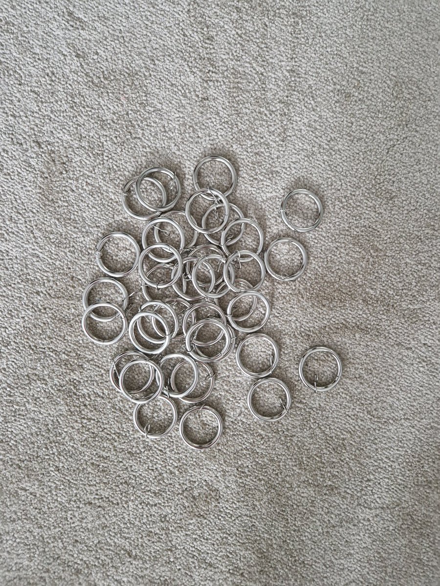 kindof_Iraqi's tweet photo. @DunelmUK please stop providing rings with your curtains rails as standard, esp when most of your curtains are eyelets. I've got 3 sets of these rings that I don't need, it's so so wasteful! https://t.co/QO2J8bMJYV
