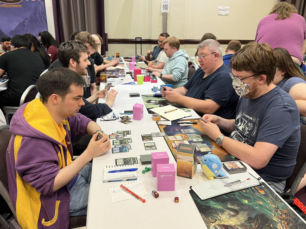 AxionNow's tweet photo. Feature match here! Round 2 of the team trios and we have veteran @Team_Axion player @12azorMtG battling one of the worlds most travelled judges, @SaviaWanderer in the Team Trio’s at our #megaweekend @Wizards_MagicEU @wizards_magic #magicjudges https://t.co/ZQ1se4ouWK
