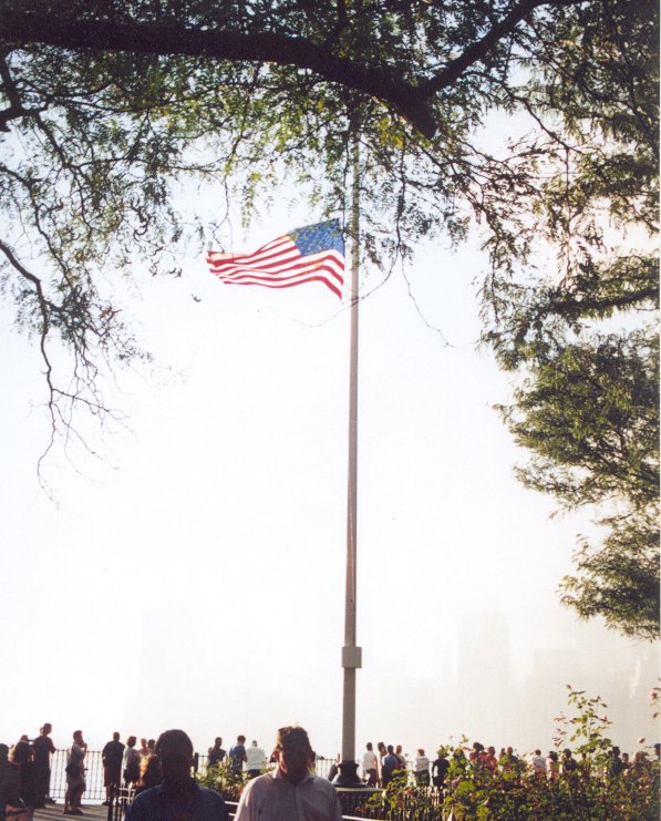 FreddySeries's tweet photo. 9/11/2001. From Brooklyn Heights. Lower Manhattan is obscured by dust and smoke late afternoon...But our flag is still standing. NEVER FORGET. https://t.co/prXO5HcKoQ