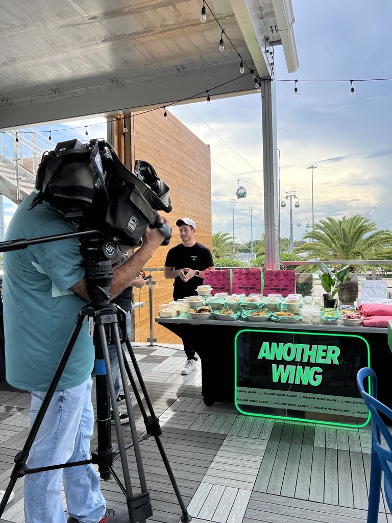 reeftechnology's tweet photo. Looking back at this week's media day for the new Fountain Plaza Tailgate at @HardRockStadium in our hometown HQ. @Another__Wing by @djkhaled is now available for all @MiamiDolphins game days! Catch the best wings in the game starting today. 🏈🐬 #FinsUp #AnotherWing https://t.co/r11SyhIh1E