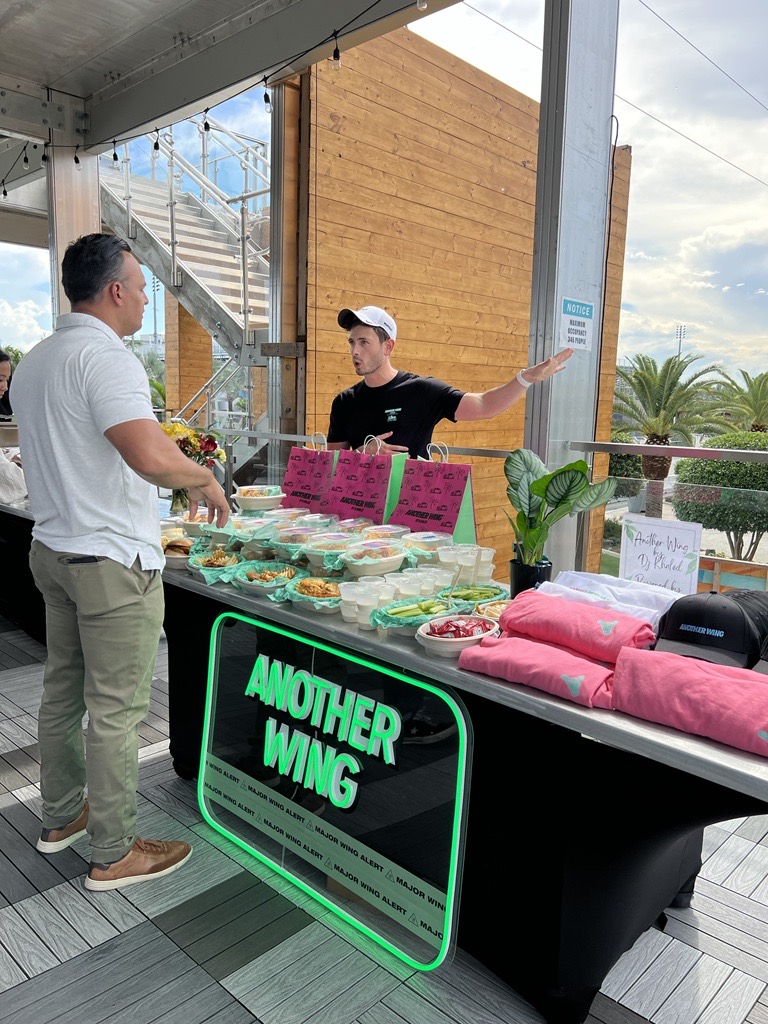 reeftechnology's tweet photo. Looking back at this week's media day for the new Fountain Plaza Tailgate at @HardRockStadium in our hometown HQ. @Another__Wing by @djkhaled is now available for all @MiamiDolphins game days! Catch the best wings in the game starting today. 🏈🐬 #FinsUp #AnotherWing https://t.co/r11SyhIh1E