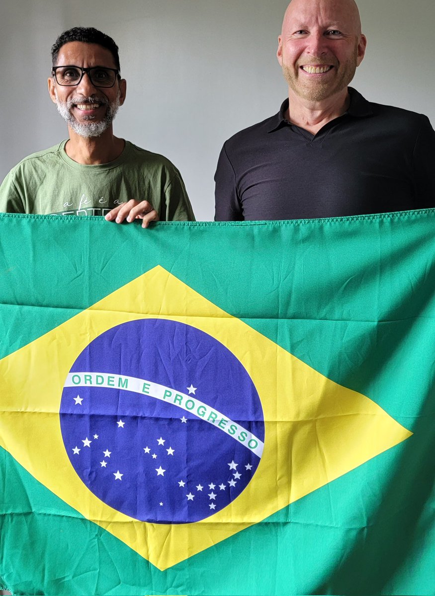 PastorJimLyon's tweet photo. Sunday morning. In Brazil. Hoping to return to the States today, but many detours and delays. But so thankful for the chance to have been here--and learn from great men and women of God, like these (including Chair of ChoG General Assembly Brazil holding flag with me). #JesusGuys https://t.co/DbjENBn6G1