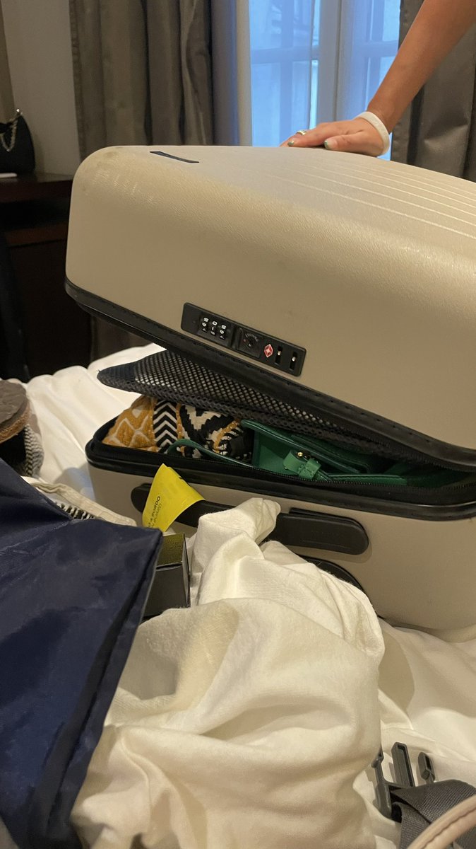 megb9's tweet photo. nadia trying to zip up her suitcase. a saga. https://t.co/ZFMK8WFSpe