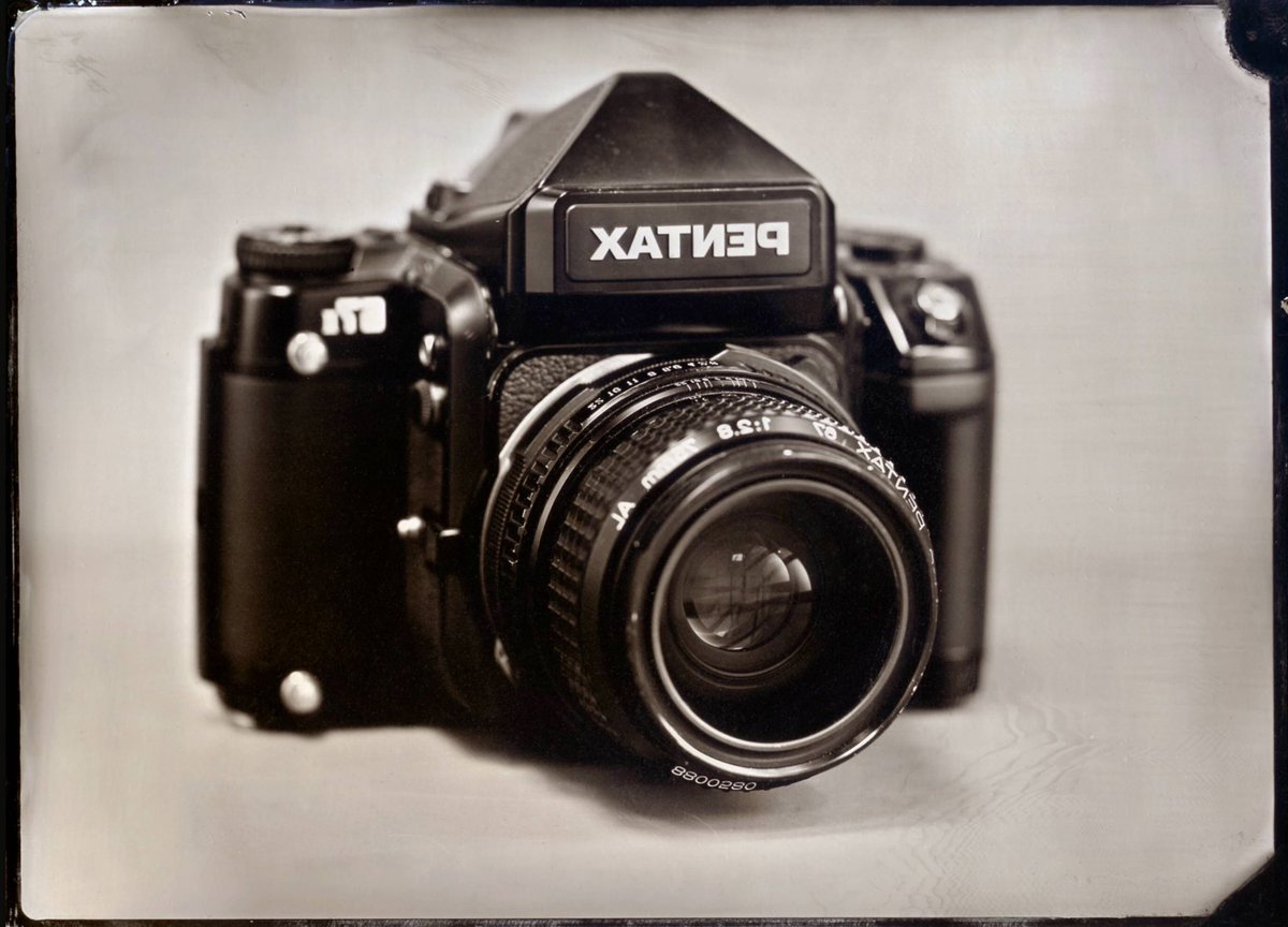 ghostshaped's tweet image. The Pentax 67 75mm 2.8AL is my #1 favorite lens I’ve ever used. My desert island lens. Here’s a wet plate of it, and 3 portraits I’ve made using it. Getting a 35mm field of view mixed with an almost LF look handheld makes it perfect in my eyes.