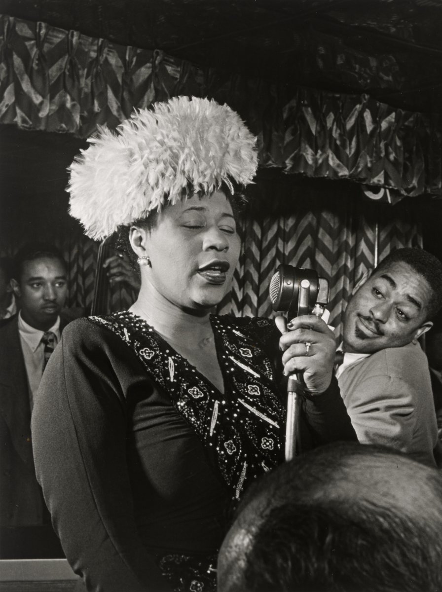 Ella Fitzgerald, Dizzy Gillespie and Ray Brown performing at the Downbeat Club in New York City, 1947 Photo by William P. Gottlieb