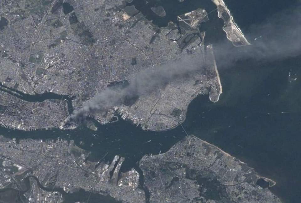 airlivenet's tweet image. On September 11, 2001, NASA astronaut Frank Culbertson took this photo from the ISS of smoke rising from the Twin Towers in New York City
