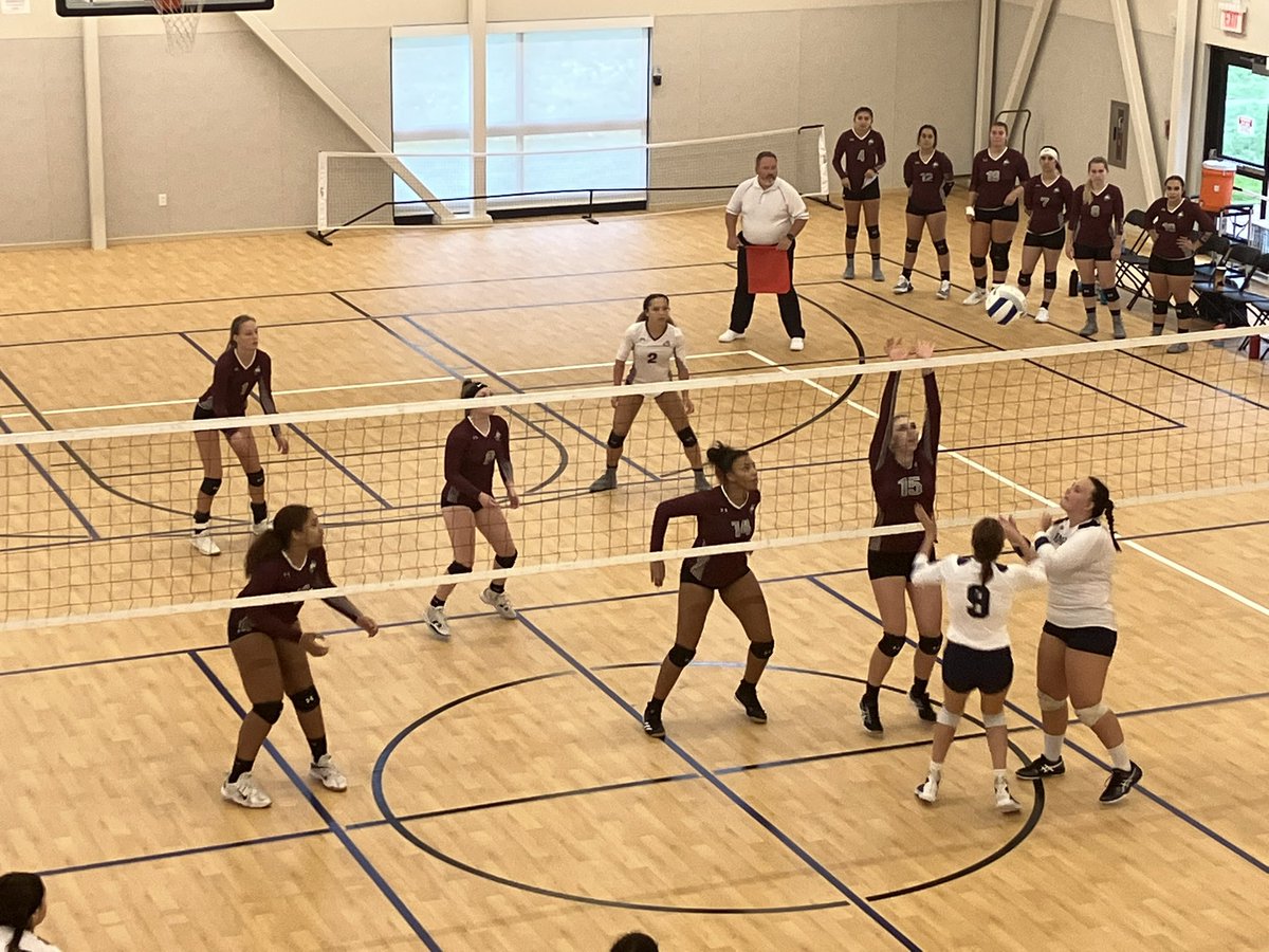 Bay Path in a close match up 2 sets to 1 with set four at 14-20 vs The King’s College