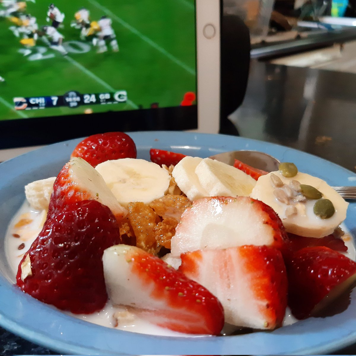EmjayMj2's tweet photo. School holiday treat cereal, Crunchy Nut Corn Flakes, albeit buried under ALL the trimmings. 🤪 #makingbreakfast 🍓 https://t.co/5JPxAmOH3r