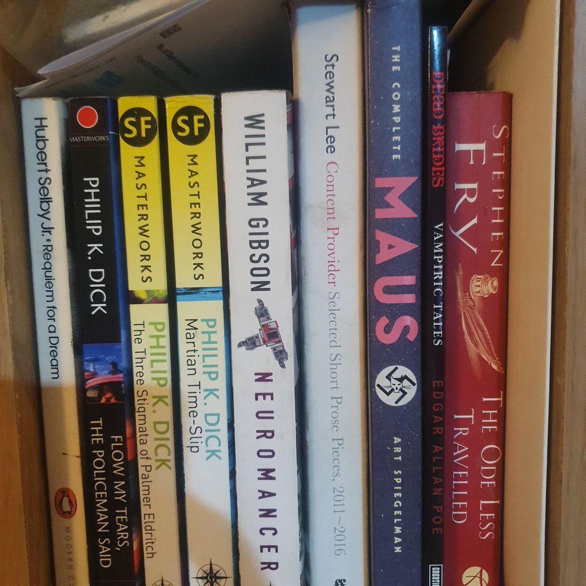 MartinFicken's tweet photo. @EJRFoto @neilhimself He's in the bookshelf along with a few other classics... https://t.co/OMGMENpNsX