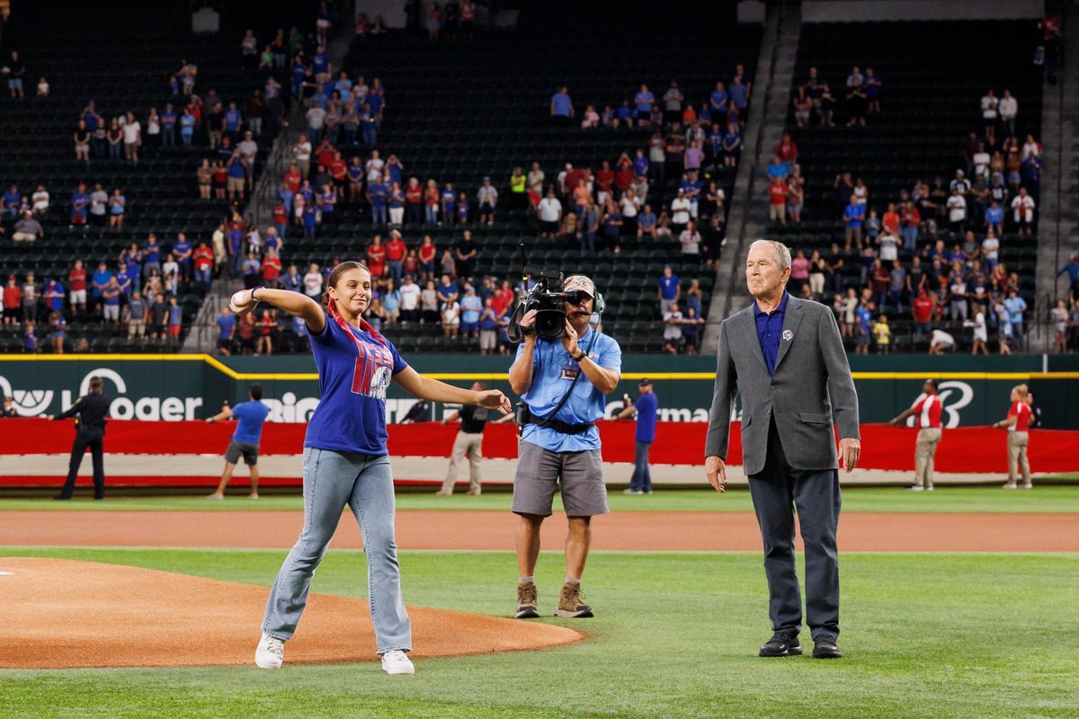 Brotherhoodfwt2's tweet photo. Our president and his daughter who throughout the first ceremonial pitch for today’s game @Rangers in honor of 9/11.

@GeorgeWBush__ brought the baseball to the mound for her to throw.

What an honor🇺🇸 https://t.co/Igcq3mHi9t