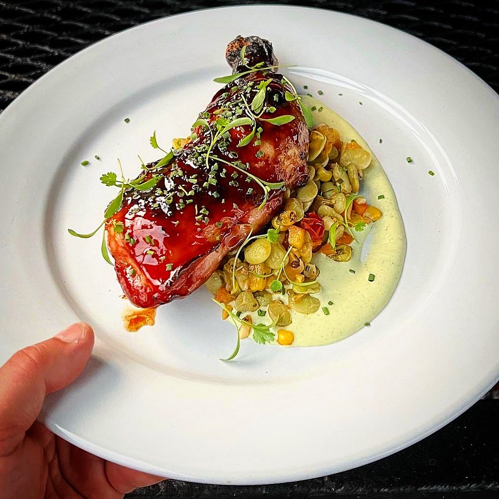 chefbillyd's tweet photo. Smoked Chicken 1/4’s glazed in @bradford_watermelons molasses, John’s Island butterbean & peach succotash finished with jalapeño lime butter, coriander crema from last week’s #FishAndFeast @Paws_Up
.
.
.
#southinyourmouth #smoked #chicken #embersonly https://t.co/RPLCtVSwVd