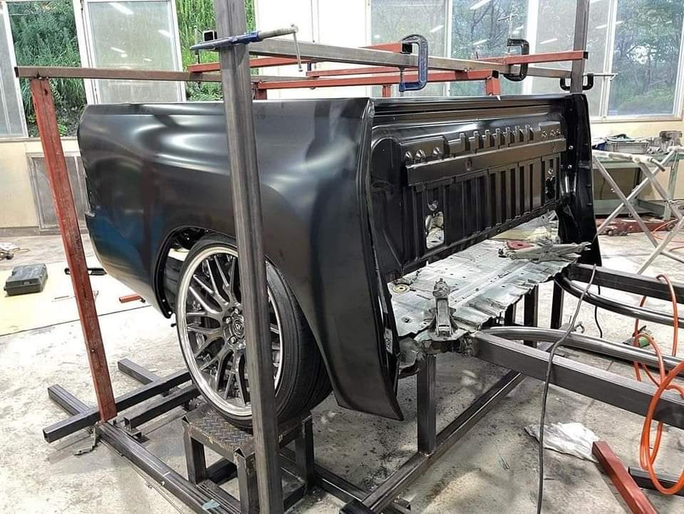 Fuelgarden's tweet photo. Something crazy and amazing is being built in Thailand 🇹🇭 right now. Building a luxurious pickup truck by combining a Toyota Alphard and a Toyota Hilux. | #FUELGARDEN 🇲🇾

#toyota #alphard #hilux #mpv #pickup #thailand #jdm #customcars #carculture https://t.co/p6matPO6WJ