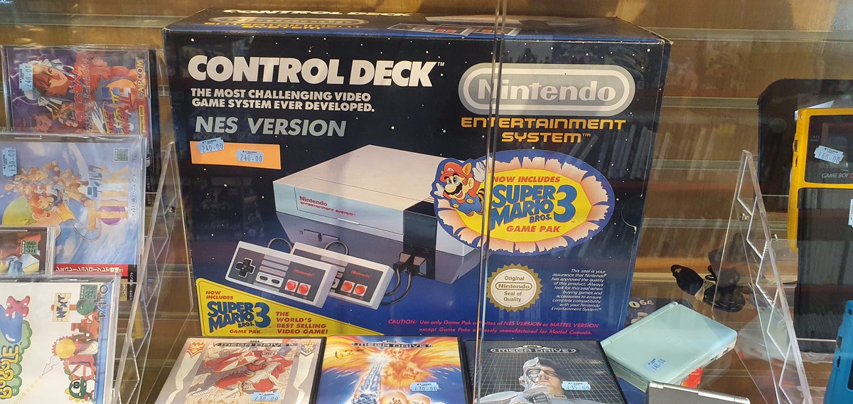 Mr1000CR's tweet photo. My local Nerd Store came up trumps yesterday with this original boxed NES. The want was strong! #mtgames #Nintendo https://t.co/JsfMHxEv0O