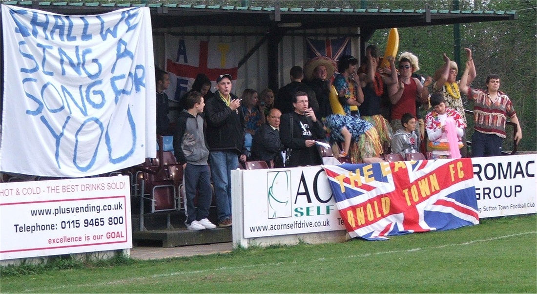 ArnoldTownFC's tweet photo. Another dip into the Arna family album - a notable Notts Senior Cup evening #behindtheflag at the Fieldings
📷@Papapix https://t.co/UYooVmDfxz