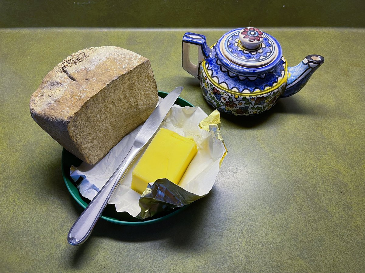 faelgaulds's tweet photo. @DailyPicTheme2 A thick loaf of dwarf bread (ala Discworld), some hot tea and Irish butter make for a #grand breakfast! My friend found this loaf-shaped rock and it immediately became famous! #DailyPictureTheme #discworld #DwarfBread #STP https://t.co/vFKVJuweEq