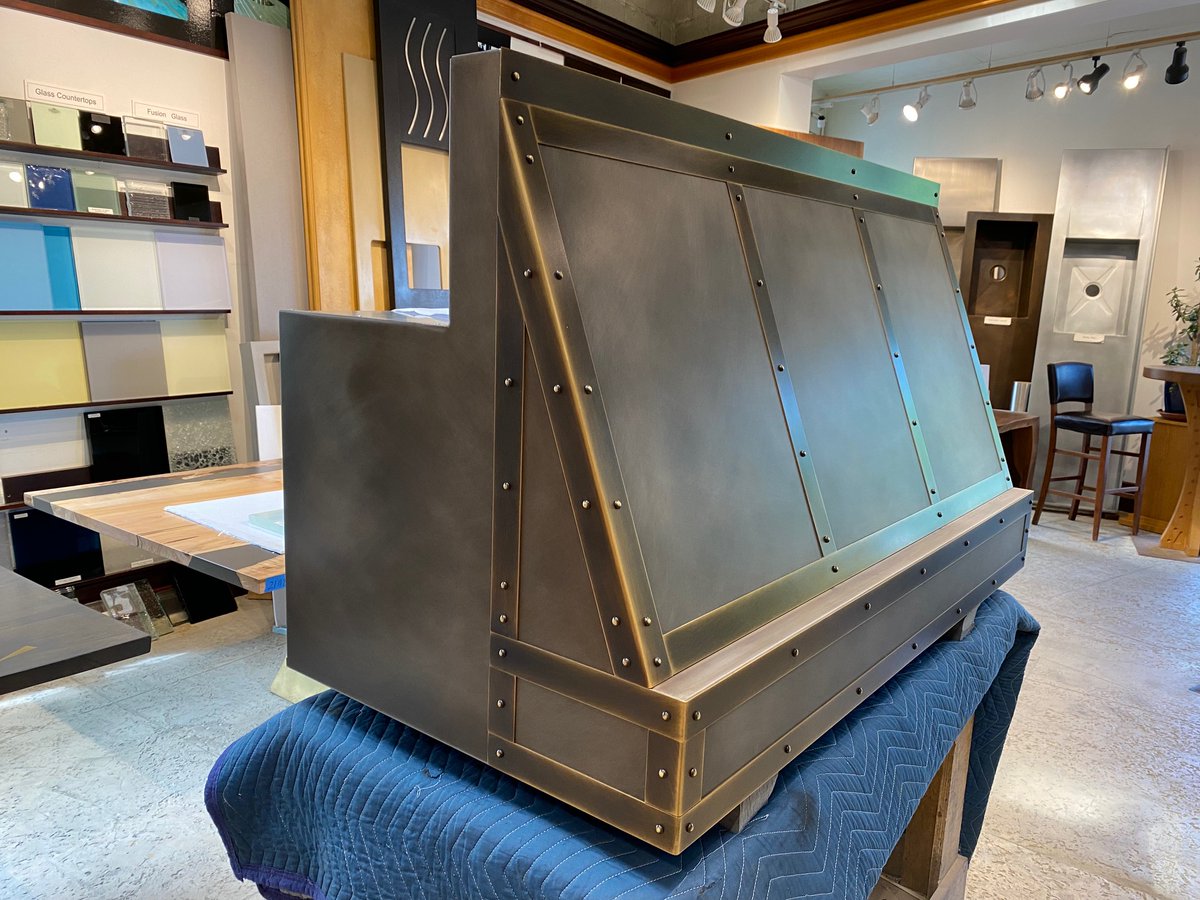 Newly finished #custom #Zinc #RangeHood ready to be installed. For all your range hood needs, bring it to Brooks! #kitchendesign #interiordesign #metalrangehood #metalkitchen #customrangehood