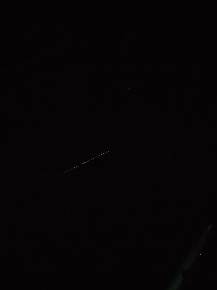 harshitfrom2004's tweet photo. this train like structure is seen in sky near hardoi shahabad uttar pradesh moving with a constant speed https://t.co/NxYFgcnof1