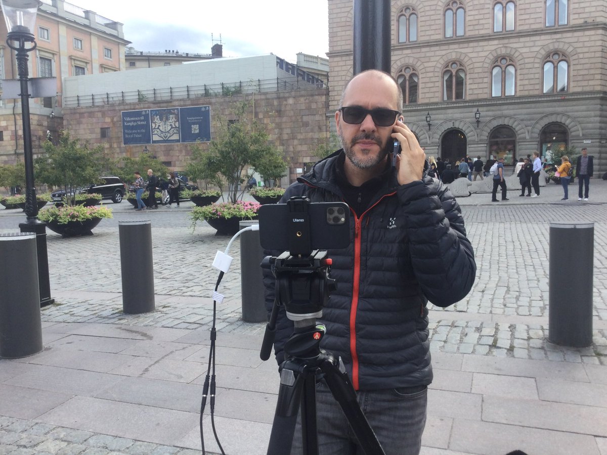 maddysavage's tweet photo. My view: Trusty videographer @benoitderrier playing role of producer, as one of our team diverted to cover BBC royal coverage. Meanwhile crowds of Swedish reporters gathering behind him. Rumours #Ulfkristersson who is likely PM in a future right wing govt may speak soon. https://t.co/sWil6o7lz8