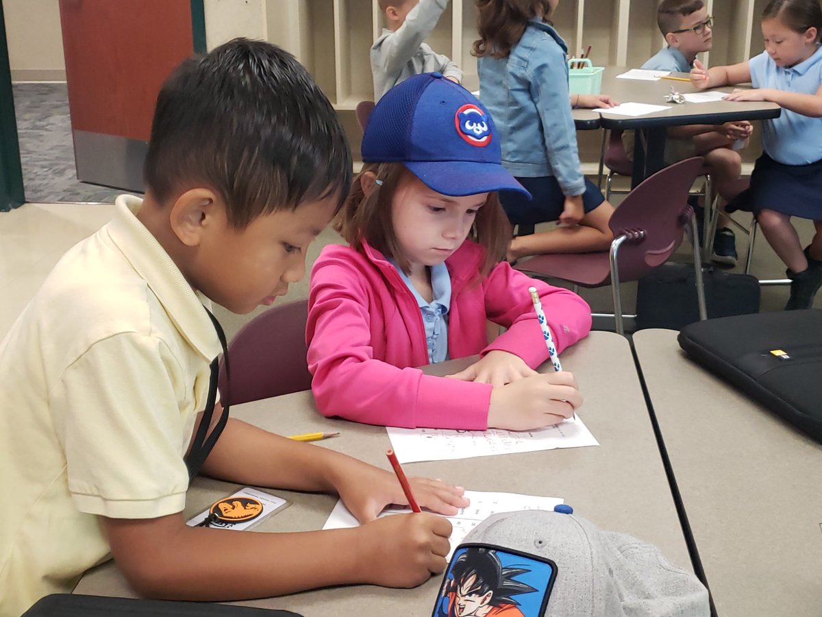 Our Bulldogs are working hard to learn how to read numbers in Spanish.