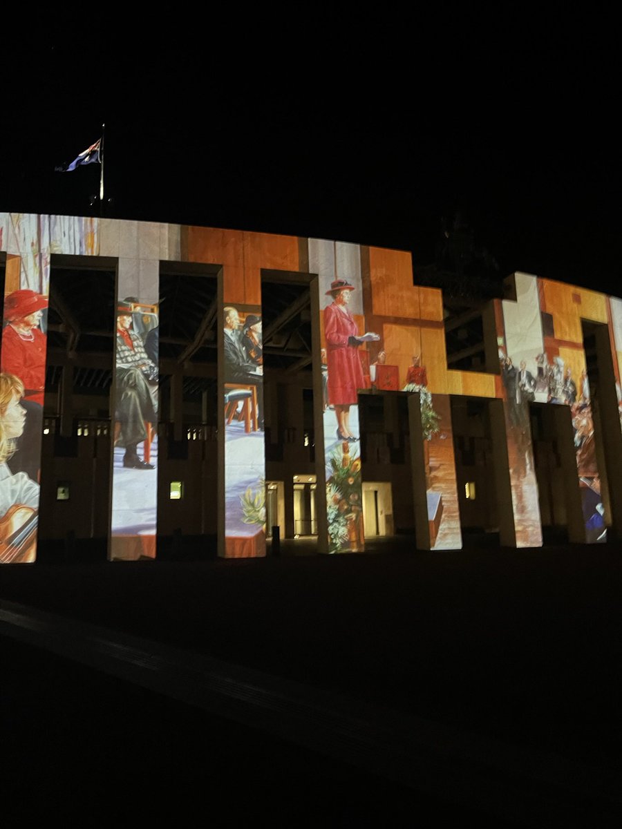 teamturner2008's tweet photo. Australia’s Parliament House in Canberra tonight, Monday 12 September, lit up with a beautiful montage of Queen Elizabeth II, the condolence book in the Marble foyer and the proclamation announcing the accession of RCIII to the throne. #QEII #RCIII #historicalmomentsintime https://t.co/74tEcGXEWU
